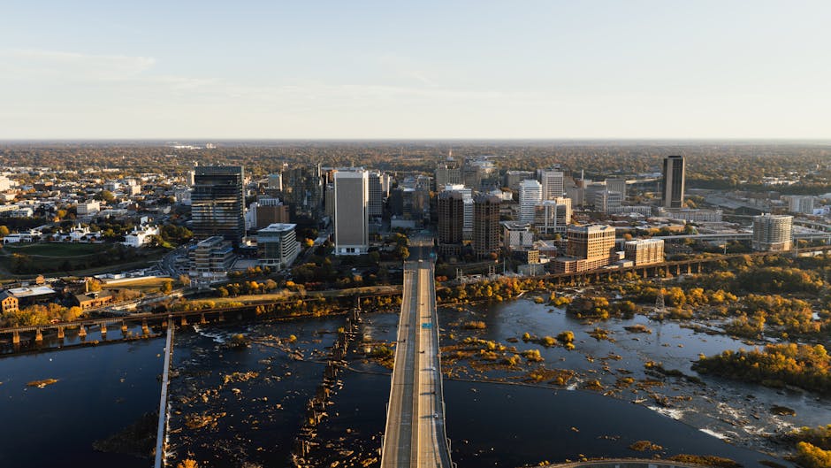 Explore an aerial perspective of the iconic Richmond, Virginia skyline during the day.